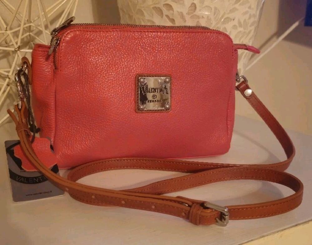 Valentina Italia pebbled leather triple-entry crossbody camera bag in a vibrant
